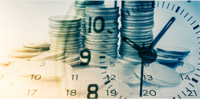 coins behind a clockface